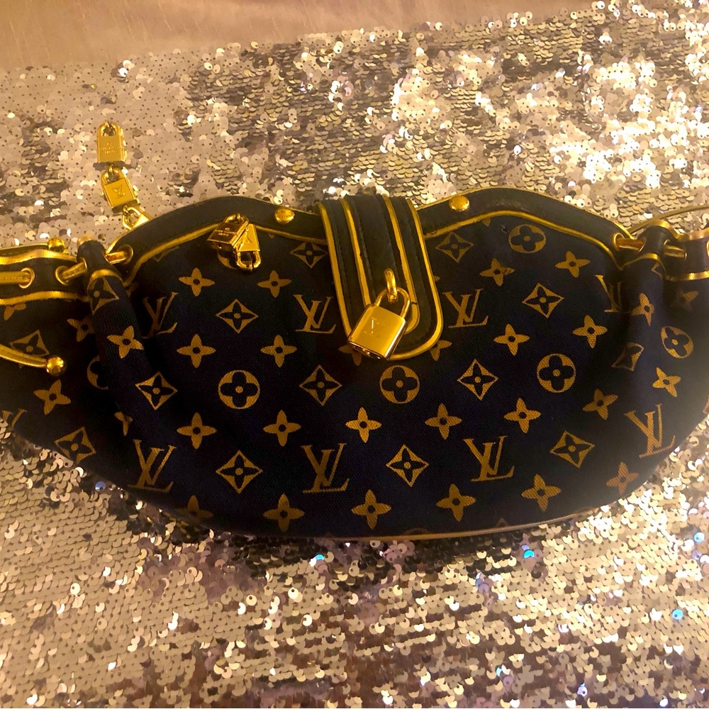 Medium vintage Louis Vuitton clutch purse